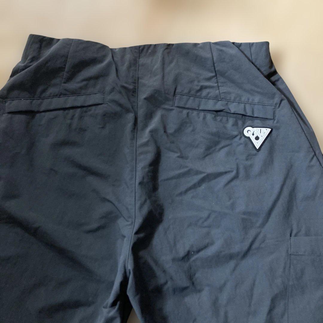 新品未使用タグ付きOAKLEYマットチャコールグレーピステウィンドブレーカーXL