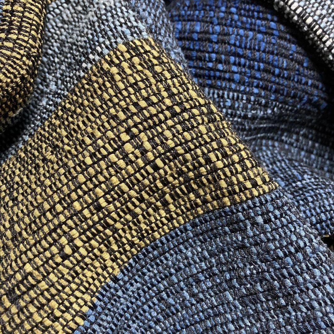 裂織の豪華なコート