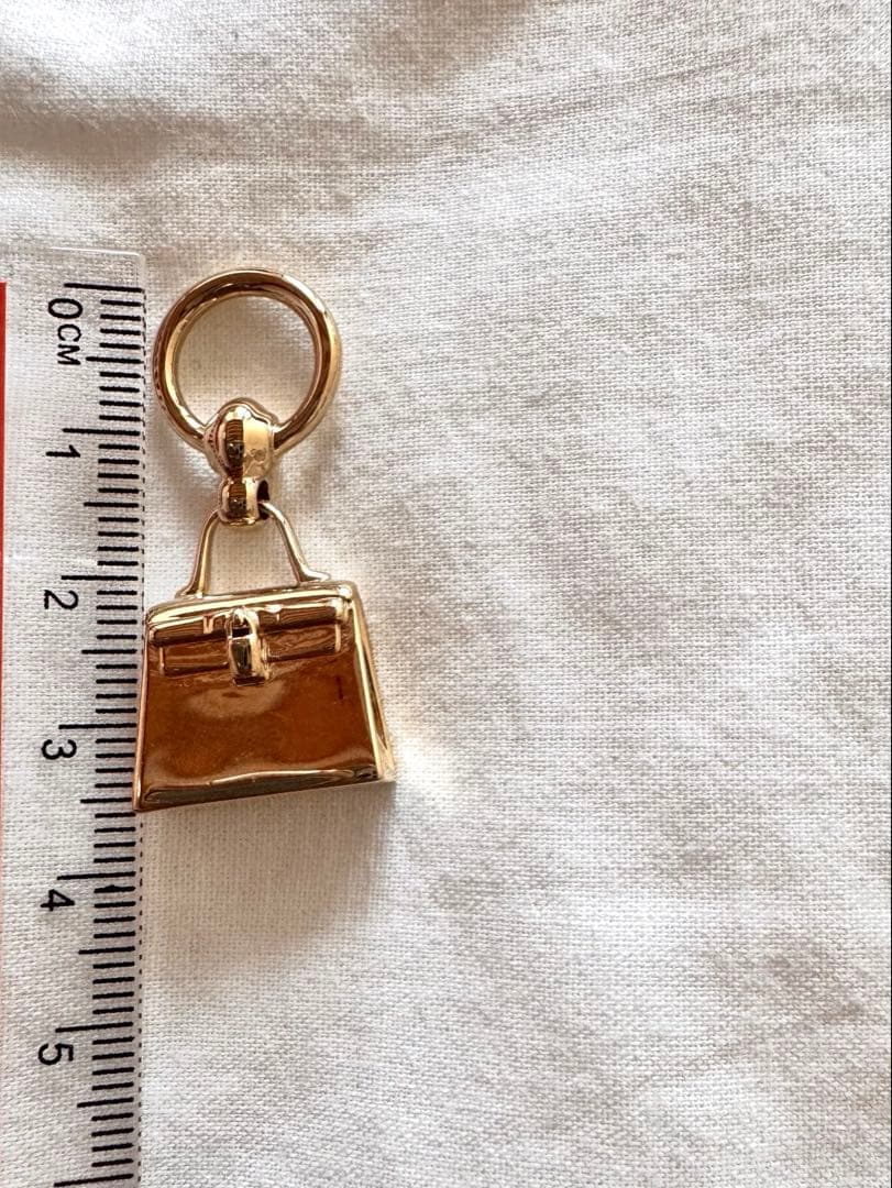 HERMES ツイリーリングケリーチャーム　シルバー