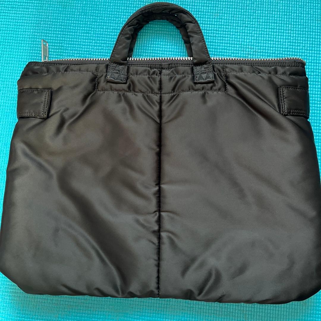 吉田カバン　ポーターの「ショートヘルメットバッグ」　ブラック（裏地オレンジ）