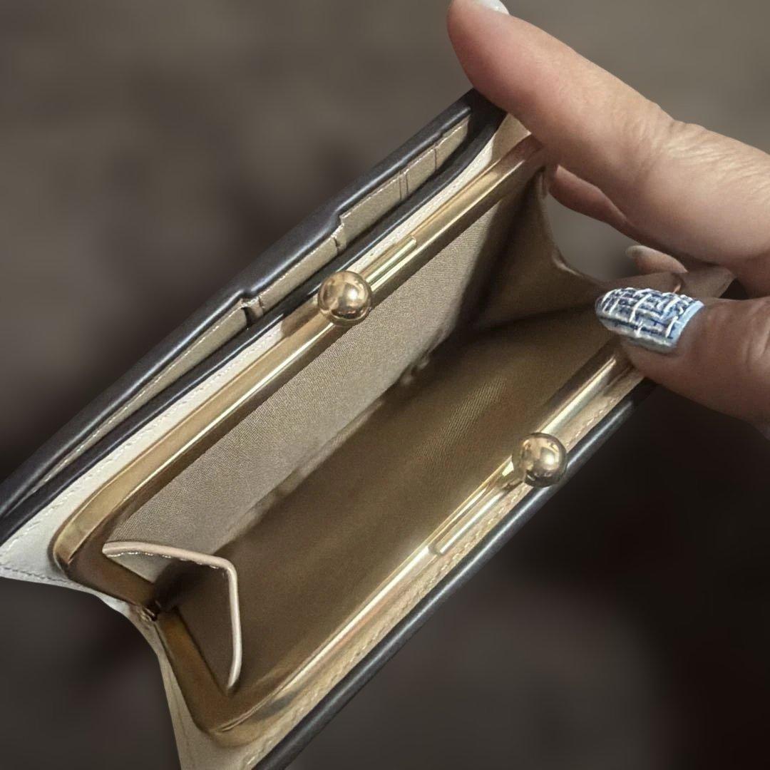 シロクマ COACH ゴールド 二つ折り財布