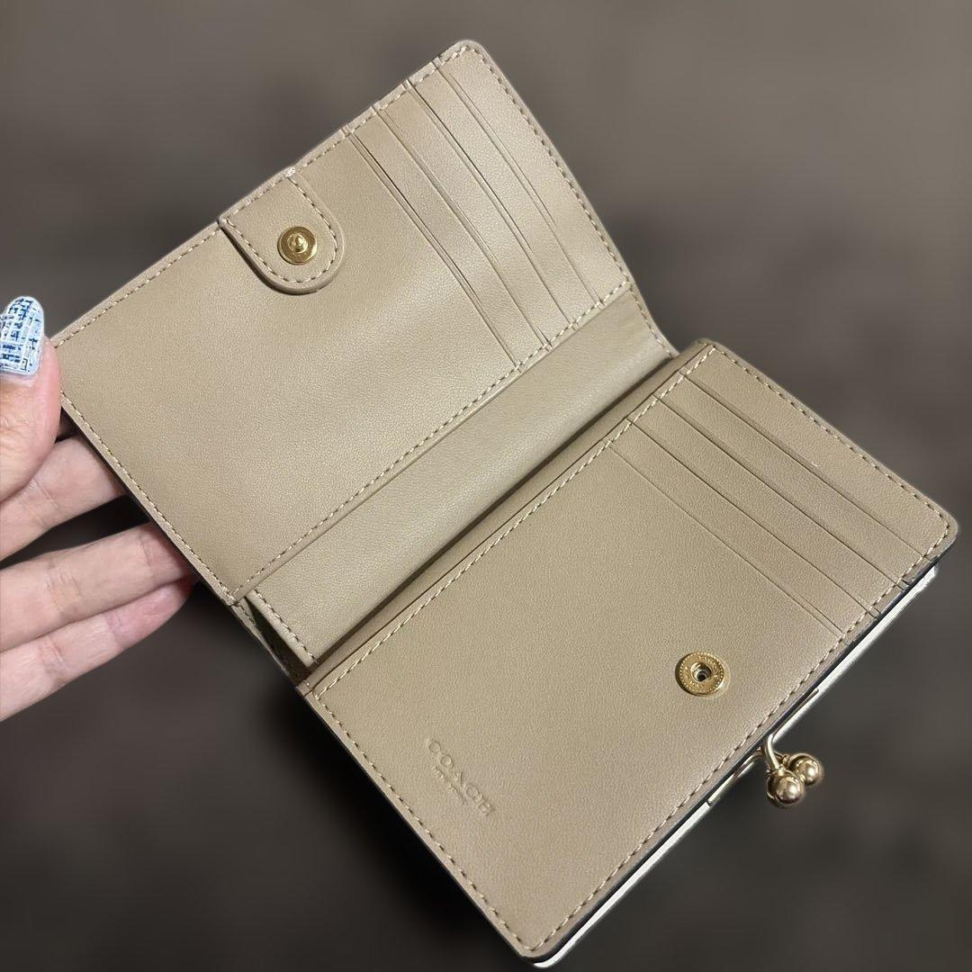 シロクマ COACH ゴールド 二つ折り財布