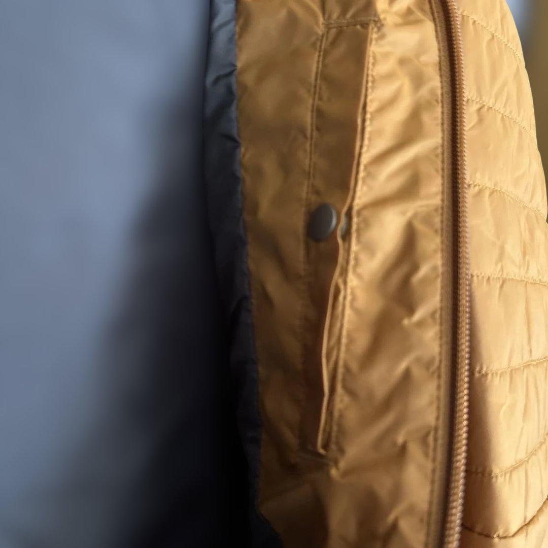 デサントムーブスポーツ 吸湿発熱ジャケット 中綿　防寒フード付き 防風 陸上競技