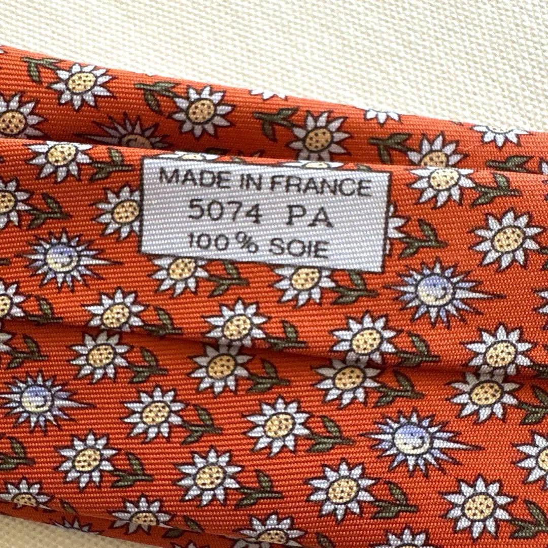 エルメス ネクタイ新品 花柄 オレンジ色 ひまわり柄 太陽柄 おひさま柄
