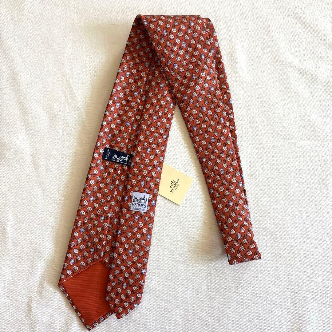 エルメス ネクタイ新品 花柄 オレンジ色 ひまわり柄 太陽柄 おひさま柄