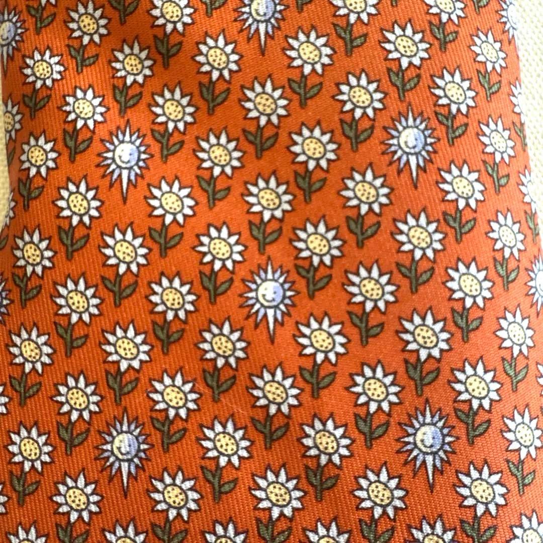 エルメス ネクタイ新品 花柄 オレンジ色 ひまわり柄 太陽柄 おひさま柄