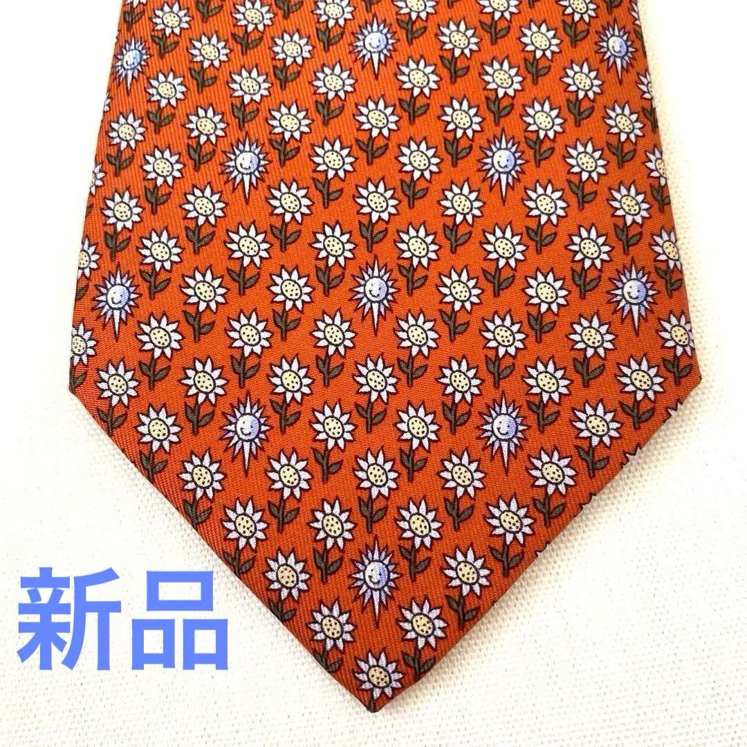 エルメス ネクタイ新品 花柄 オレンジ色 ひまわり柄 太陽柄 おひさま柄