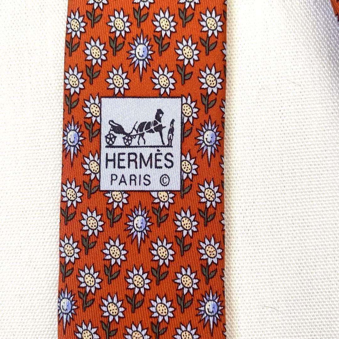 エルメス ネクタイ新品 花柄 オレンジ色 ひまわり柄 太陽柄 おひさま柄