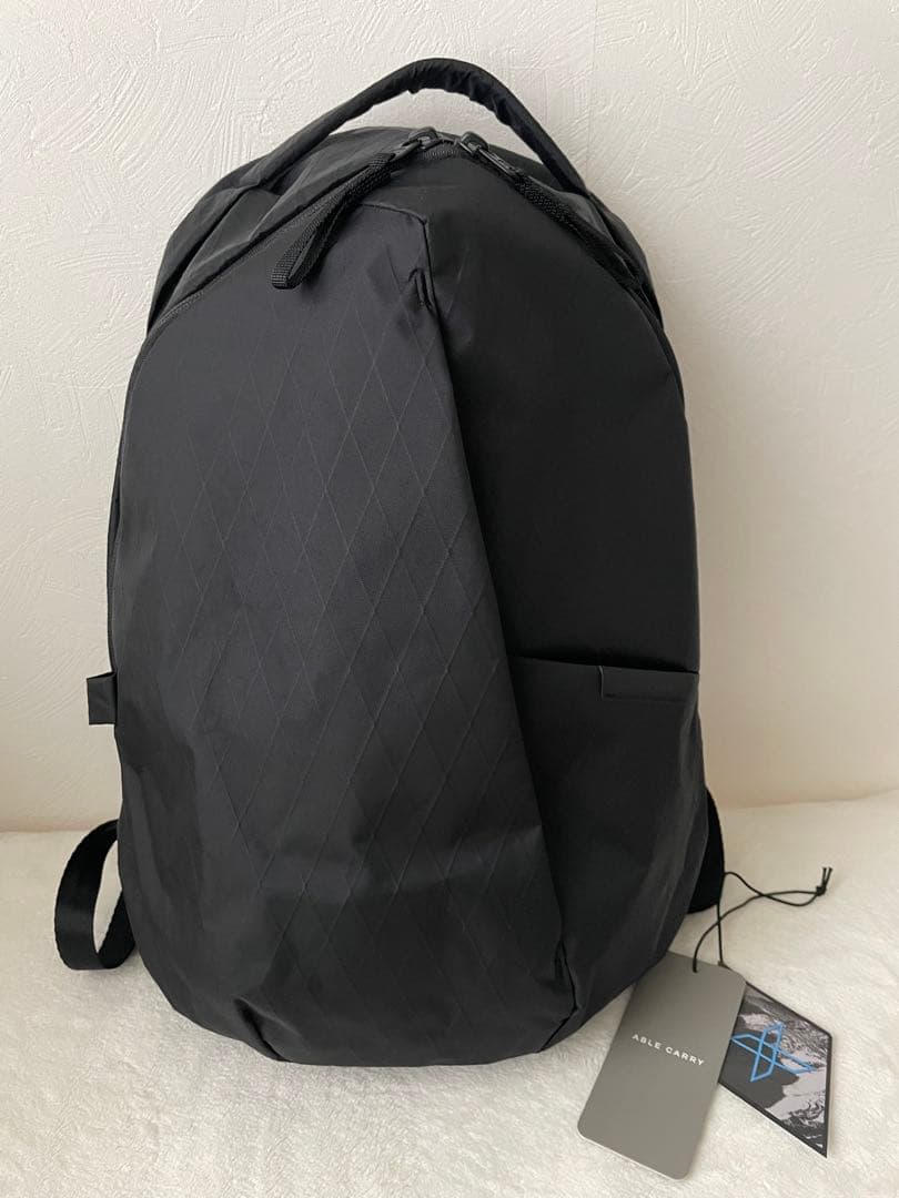 バッグ ABLE CARRY Thirteen Daybag X-Pac