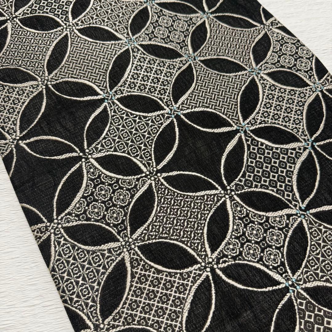 m-99 七宝 名古屋帯 黒地 正絹