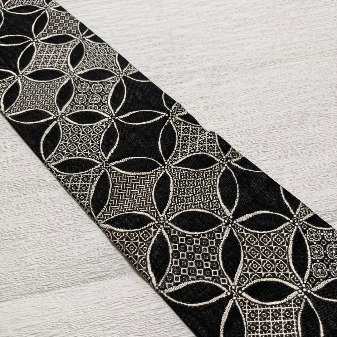 m-99 七宝 名古屋帯 黒地 正絹
