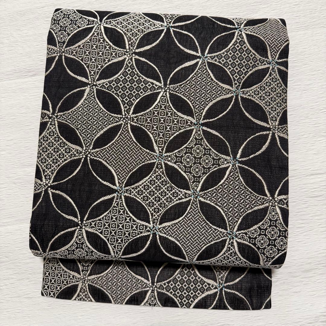 m-99 七宝 名古屋帯 黒地 正絹