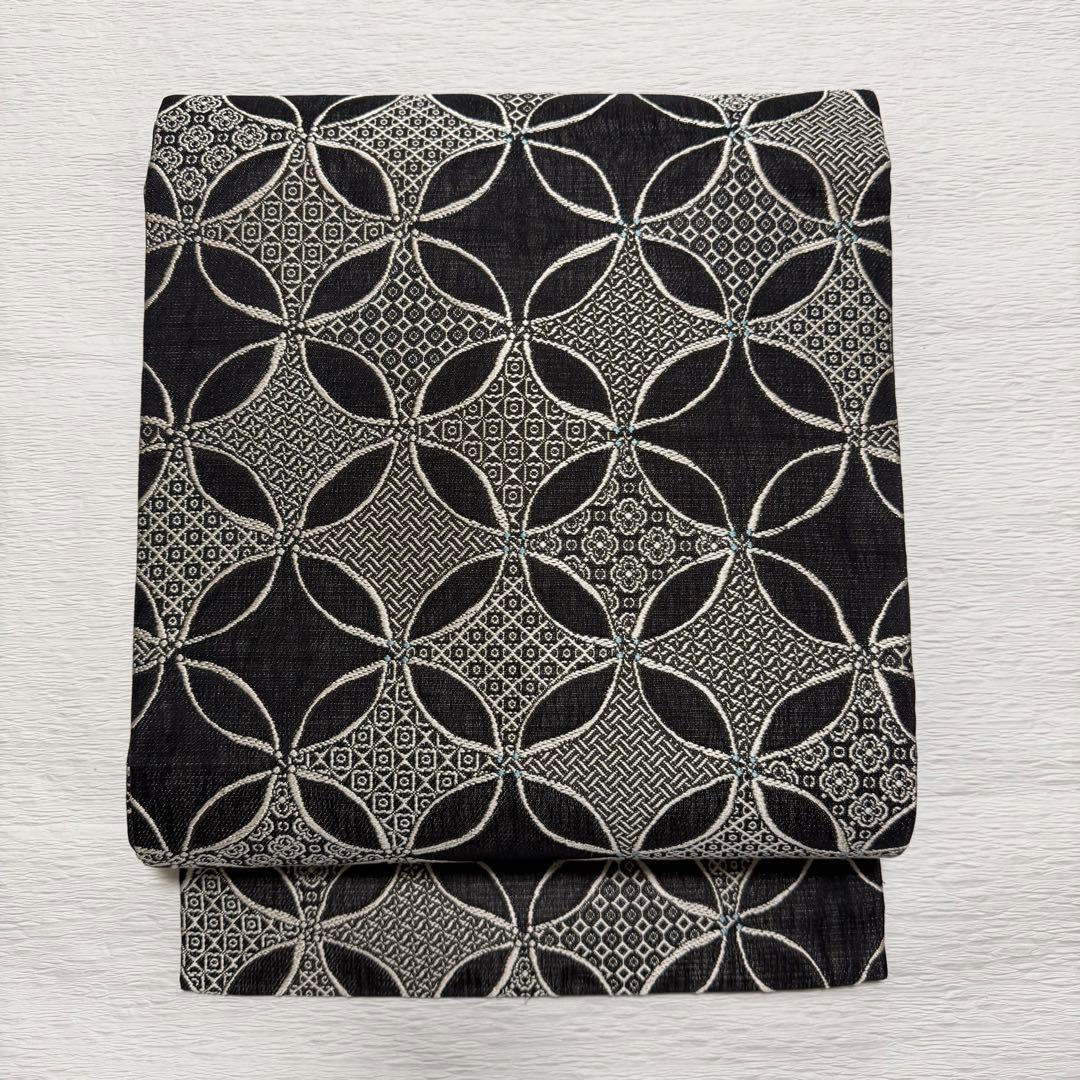 m-99 七宝 名古屋帯 黒地 正絹