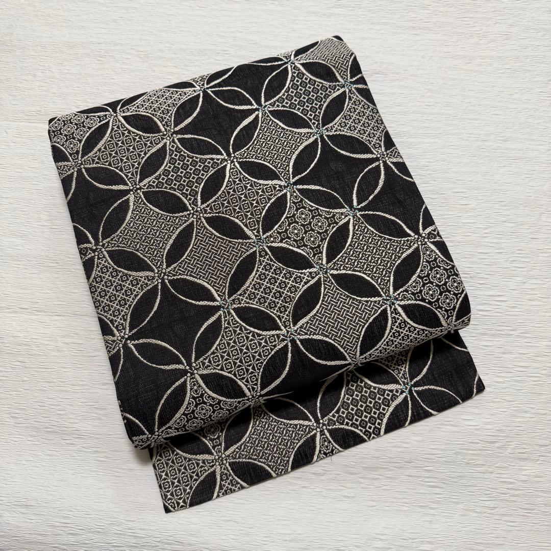 m-99 七宝 名古屋帯 黒地 正絹