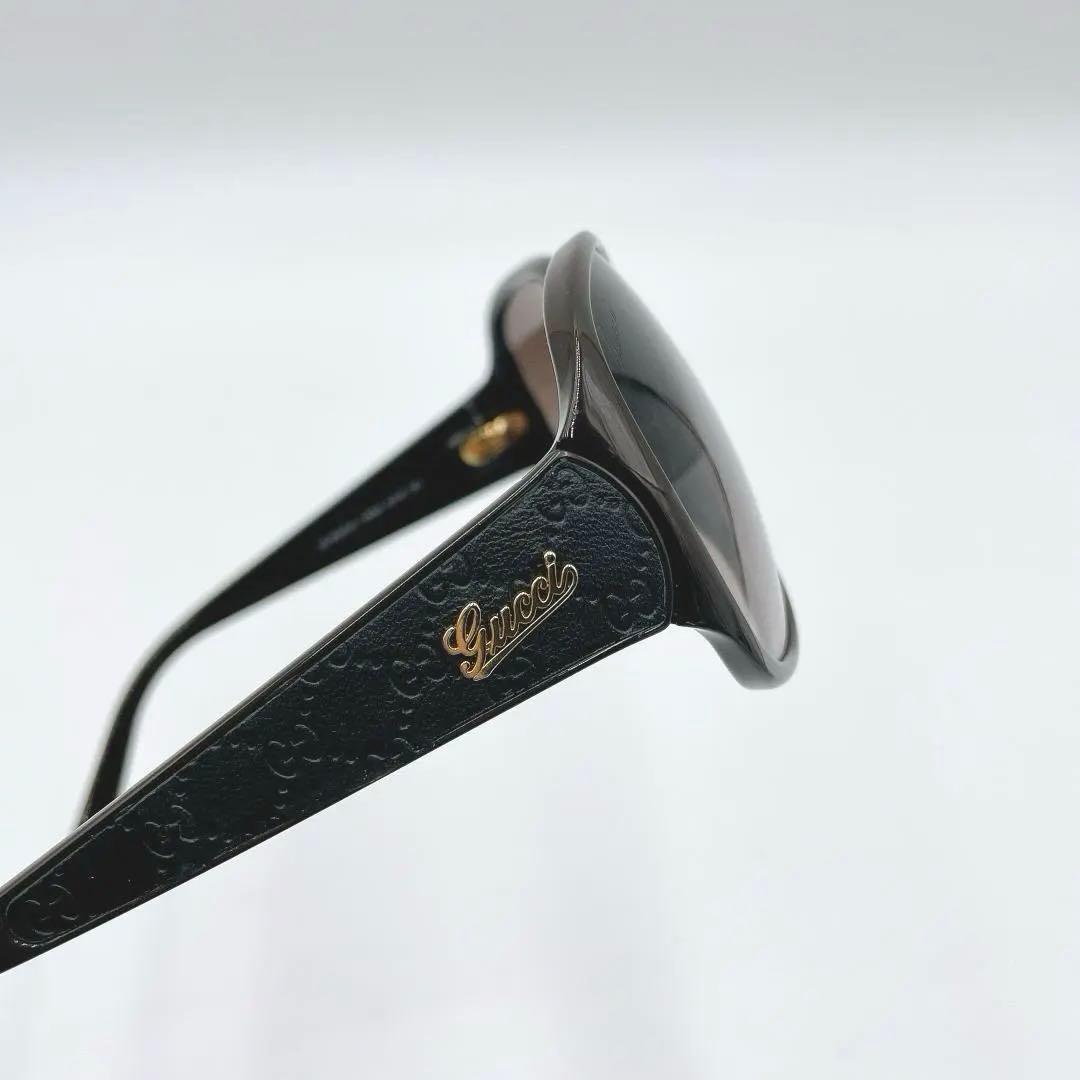 GUCCI サングラス マイクロGG 筆記体ロゴ ブラック ゴールド m536