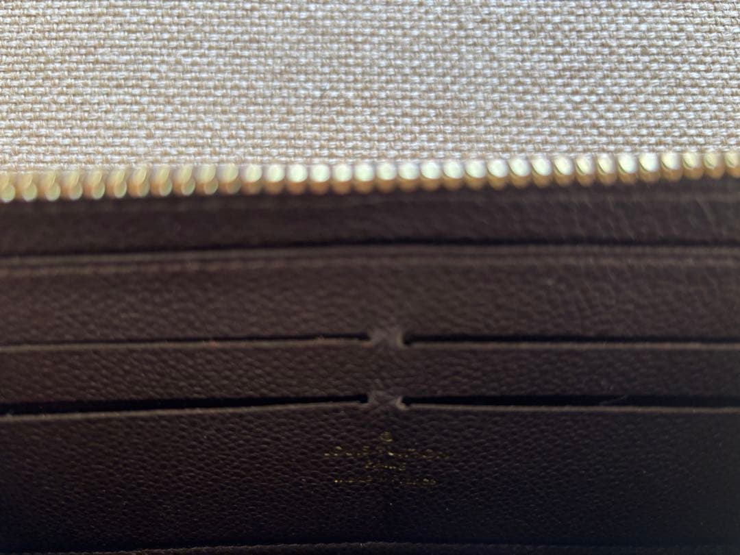ルイヴィトン モノグラム アンプラント ジッピーウォレット　ブラウン