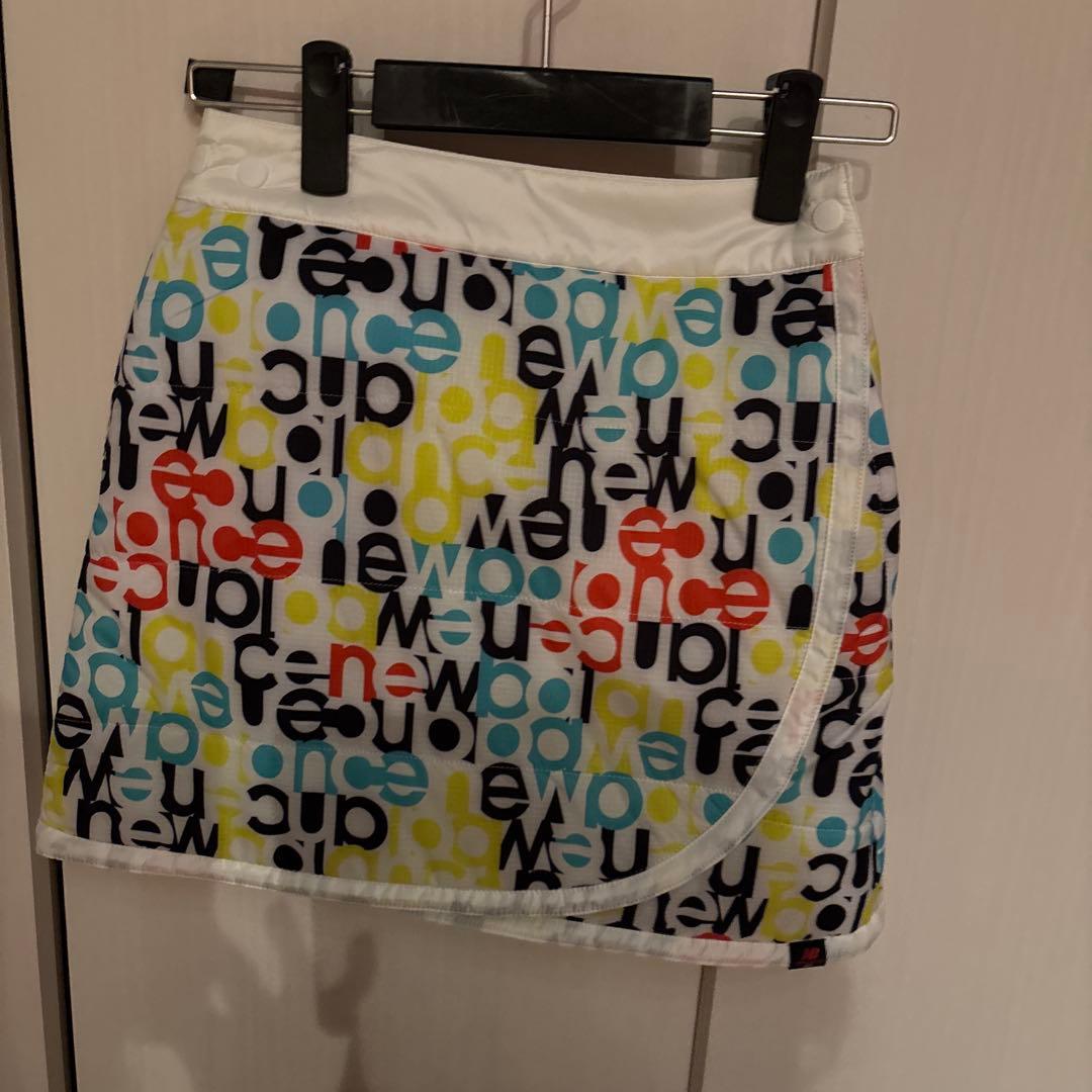 ニューバランスゴルフリバーシブルロゴラップスカートダウン生地ゴルフ女子防寒