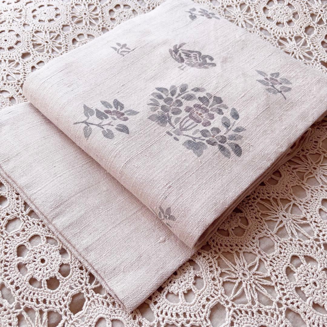 花と鳥の模様 くすんだピンクグレー ピンクベージュ 名古屋帯 紬帯