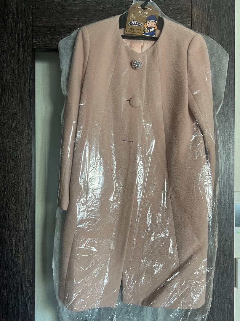 1/3までの価格。　Début de Fiore ピンク ロングコート 38