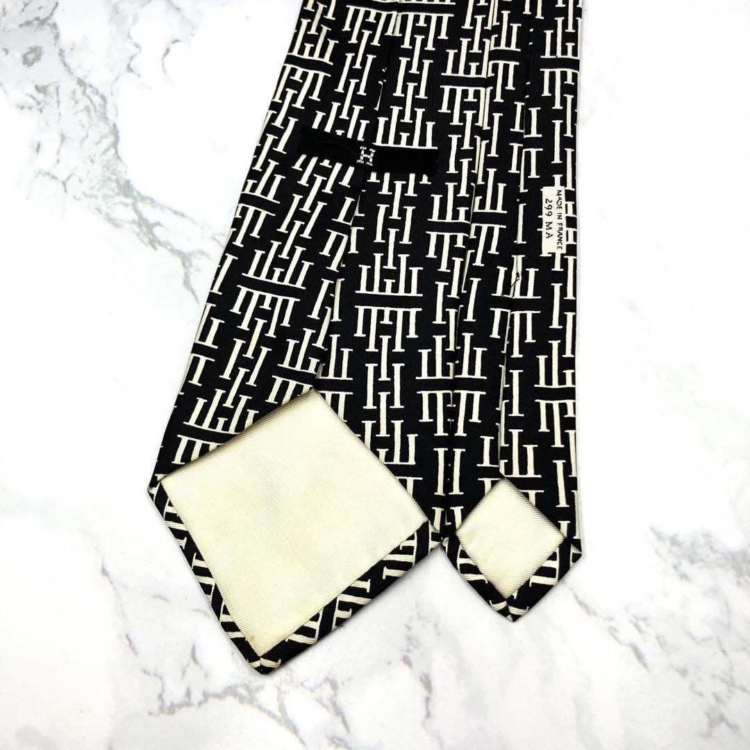 ◆良品◆HERMES エルメス ネクタイ 黒色 ロゴ柄 オシャレ 希少