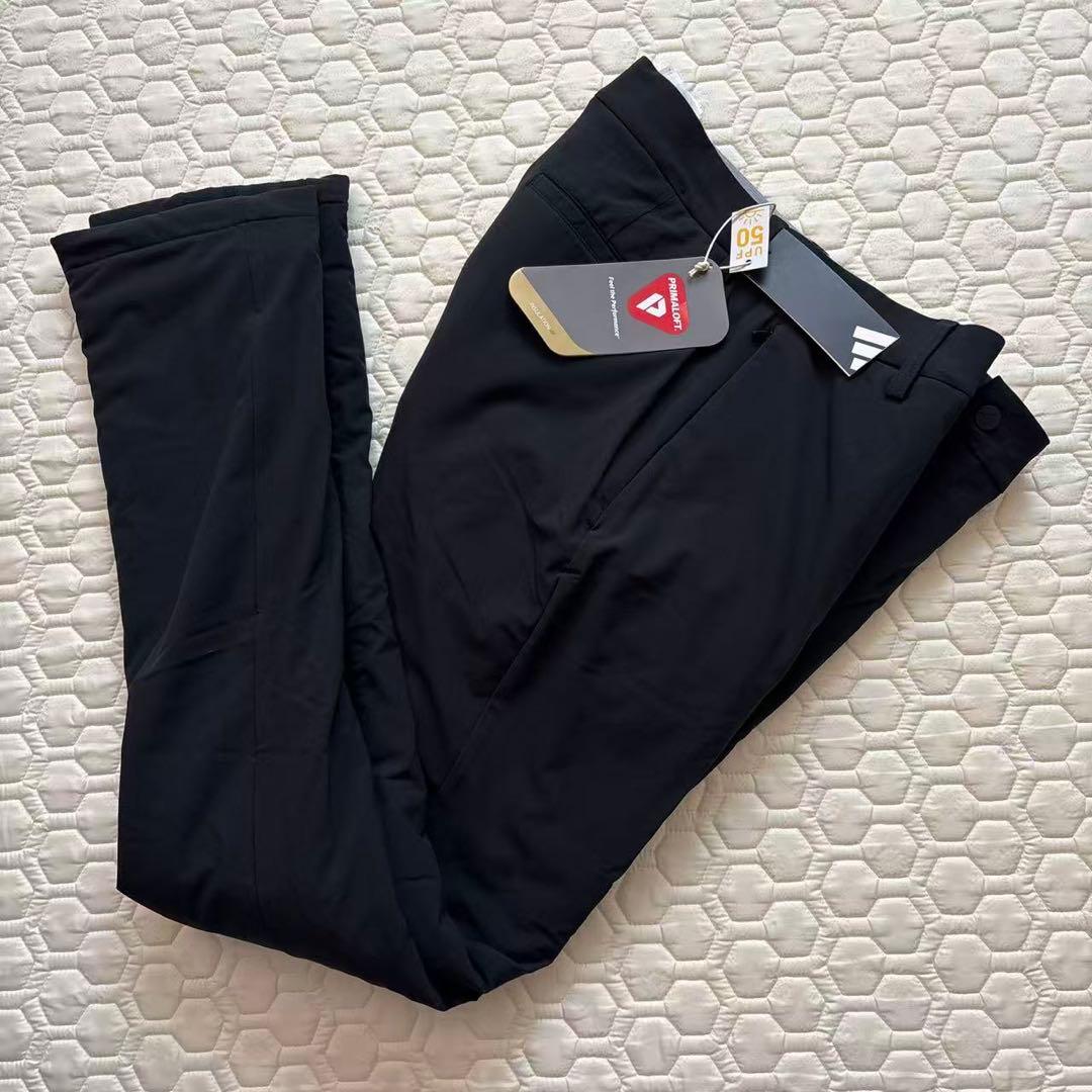 92cm新品27500円アディダスゴルフ/メンズ/秋冬/中綿ストレッチパンツ/黒