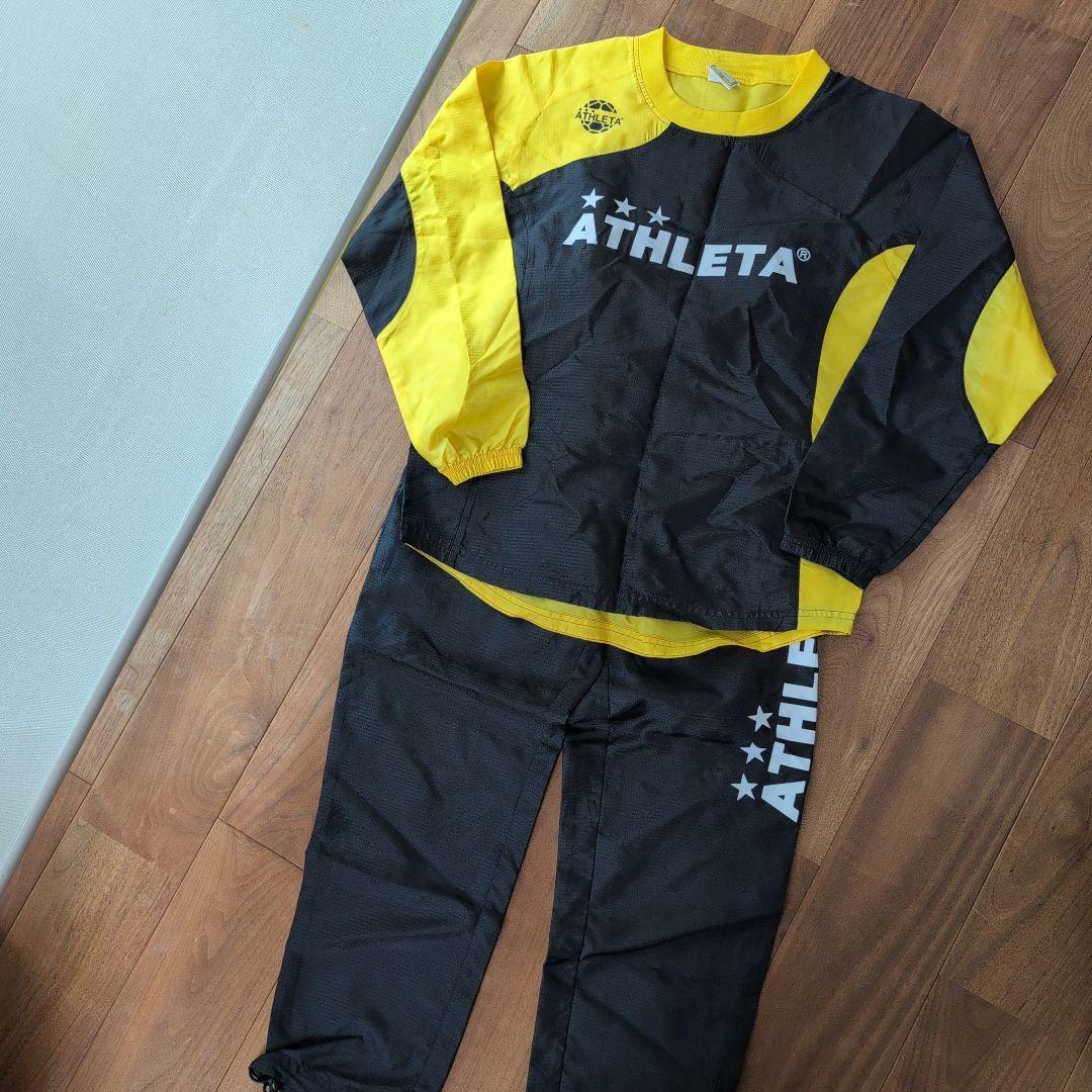 ATHLETA ピステ上下セット 150 黒/黄色